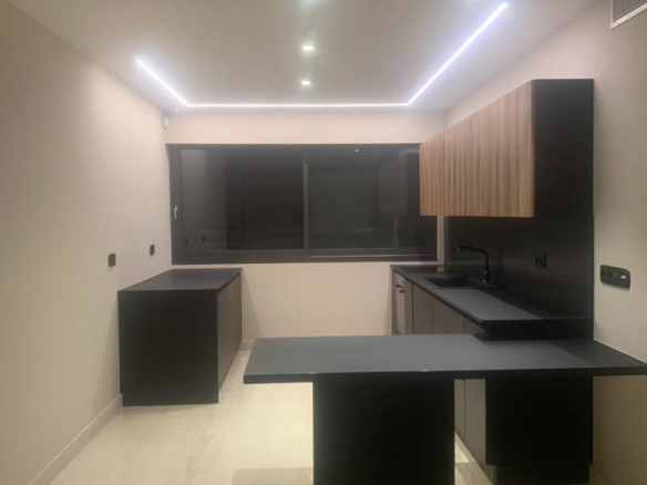 Philothei, Ground floor 100 sqm luxury construction, renovation 2022, with exclusive use of garden, 1 large junior suite bedroom, 1 master bathroom, 1 wc, living room, open plan kitchen, indoor parking space